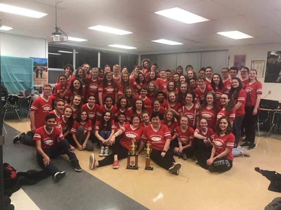 Members+of+Act+II%2C+along+with+Band+Director+Katie+Bauer+%28front+left%29+and+Director+Cheryl+White+%28front+right%29%2C+pose+with+their+two+trophies.