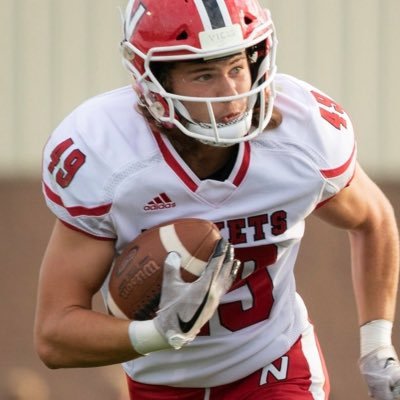 Neenah star safety Sam Jung returning a punt return. 