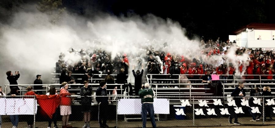 This photo captures the Homecoming 2019 football game lead by the Rocket Rowdy. Photo courtesy of Principal Wunderlich.