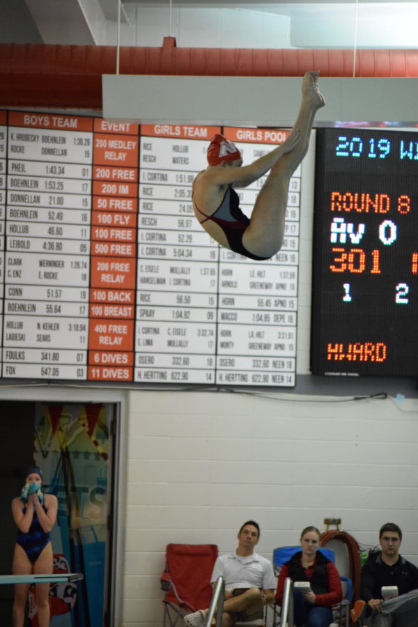 Osero dives to secure her fourth state title.