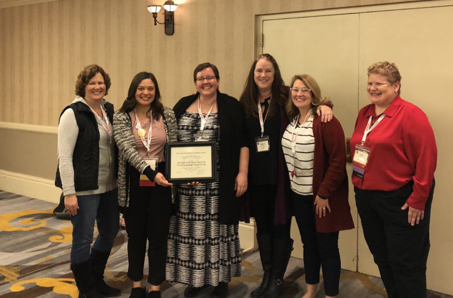 Members of the Neenah World Language department receive the 2019 Donna Clementi Blue Ribbon Award at the WAFLT State Conference (Saturday) Nov. 2. 