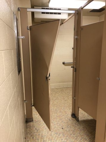 Bathroom stalls a bit bent out of shape. 
