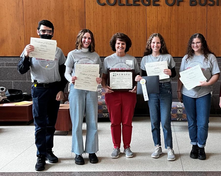 Members of the Satellite staff hold their NEWSPA awards at UW-Oshkosh (Left to right: Robert Barthell, Abi Wise, Mrs. Beth Plankey, Ashlyn Jacobs and Elaina Plankey)   