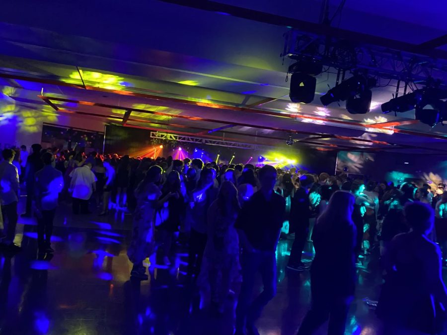 The Homecoming dance lights up the night with bright colors and inspired dance moves. 