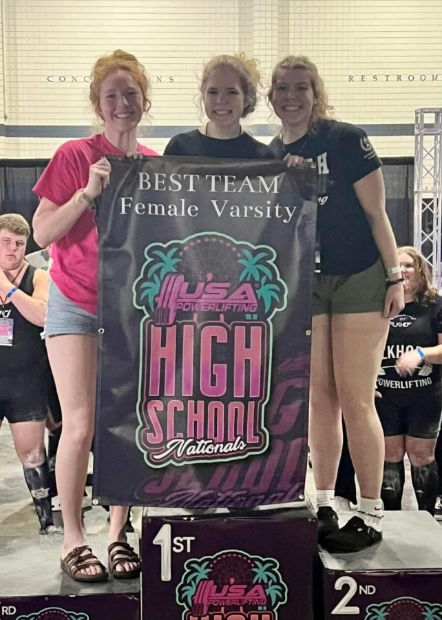 Female Equipped team with BEST TEAM - Female Varsity reward banner