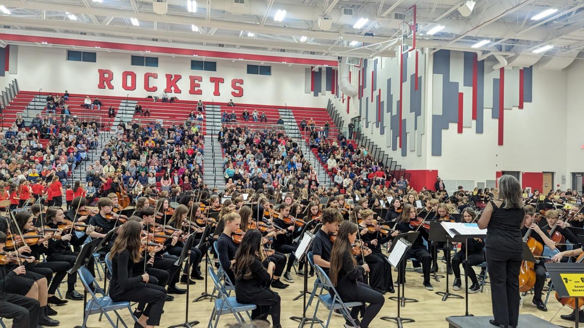 7th and 8th grade Orchestra playing.