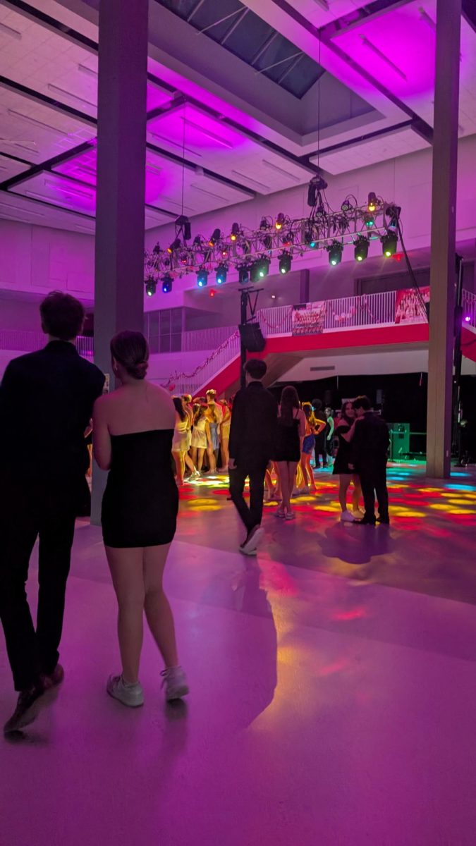 Students dance under the lights